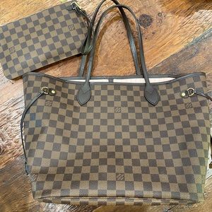 Louis Vuitton Never Full, Damier Ebene. Comes with wrist wallet and dust bag.